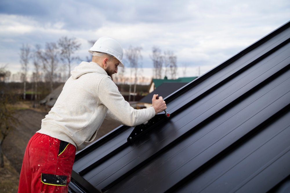 man-working-roof-medium-shot